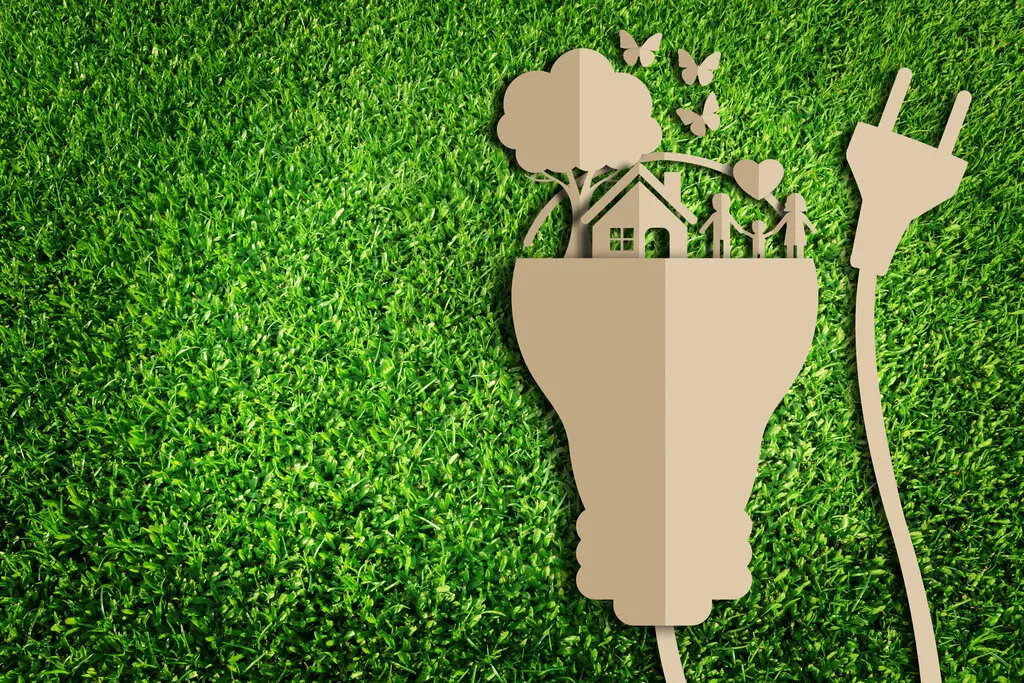 energie-sparen-haus-hausbau-geld-foerderung-23 Pappfigur auf Rasen